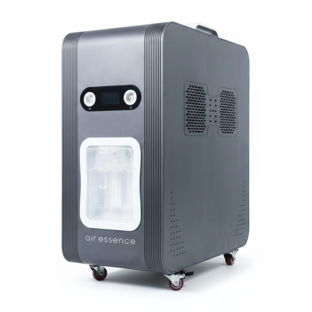 Elegancki, ciemnoszary inhalator wodoru Air Essence™ Euria E6 (1500 ml-6000 ml, H2 + O2 gaz Browna) jest wyposażony w pokrętła sterowania, ekran wyświetlacza, boczne otwory wentylacyjne, przezroczystą komorę i małe kółka ułatwiające przemieszczanie.